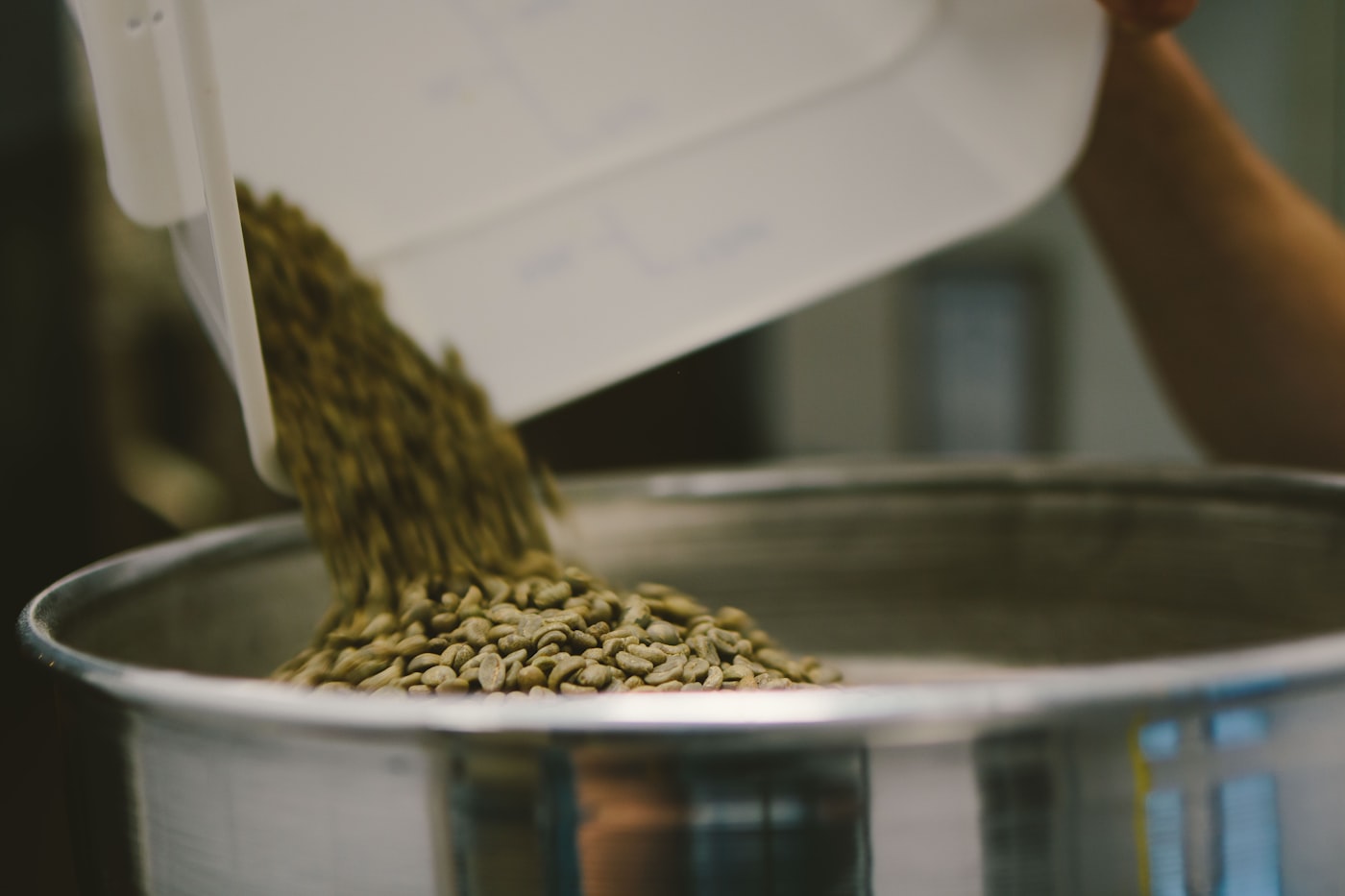 Coffee cherries being processed with water at the washing station